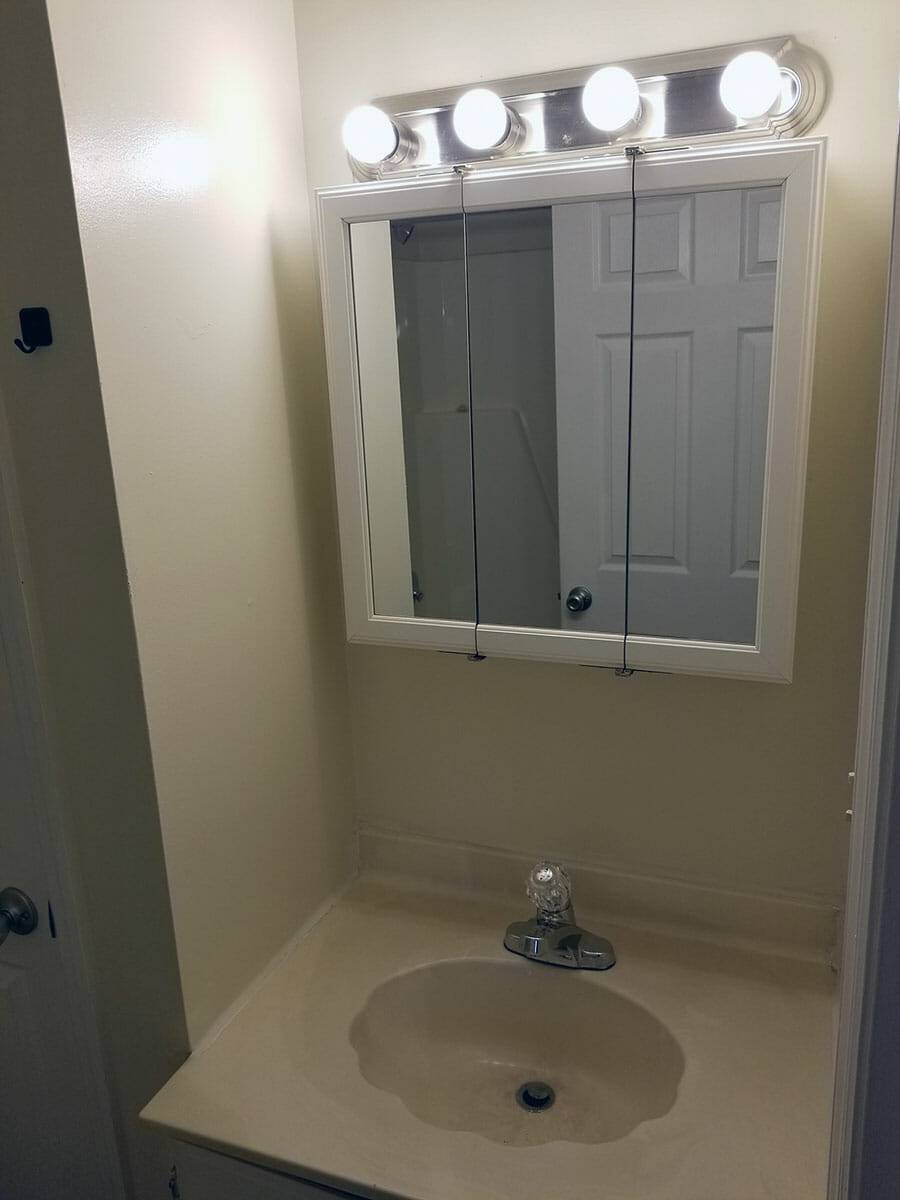 RGW Property - 178 Gazette Ave #16 - Bathroom Mirror